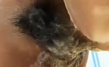 Hairy pussy gets fingered in the shower